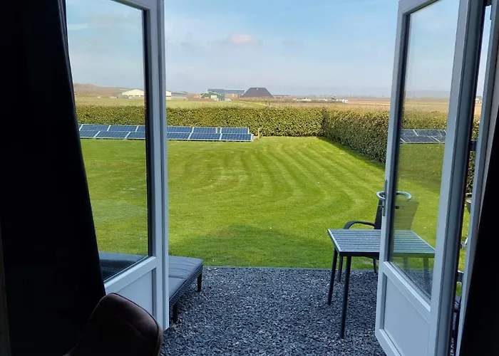 Photo de Sfeervolle Studio Vitamine Zee Met Zicht Op De Duinen Julianadorp